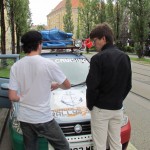 Outside of Mr. Villamil's apartment in Munich, painting the anchor on the hood