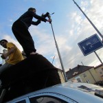 Other Mongol Rally Team documenting their entrance to the Klenova Castle